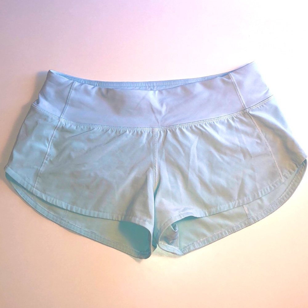 Size 4 speed short 5” inseam. Worn once